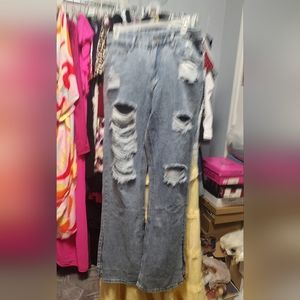 Distressed blue jeans